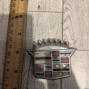 Cadillac Silver and Red Car Emblem